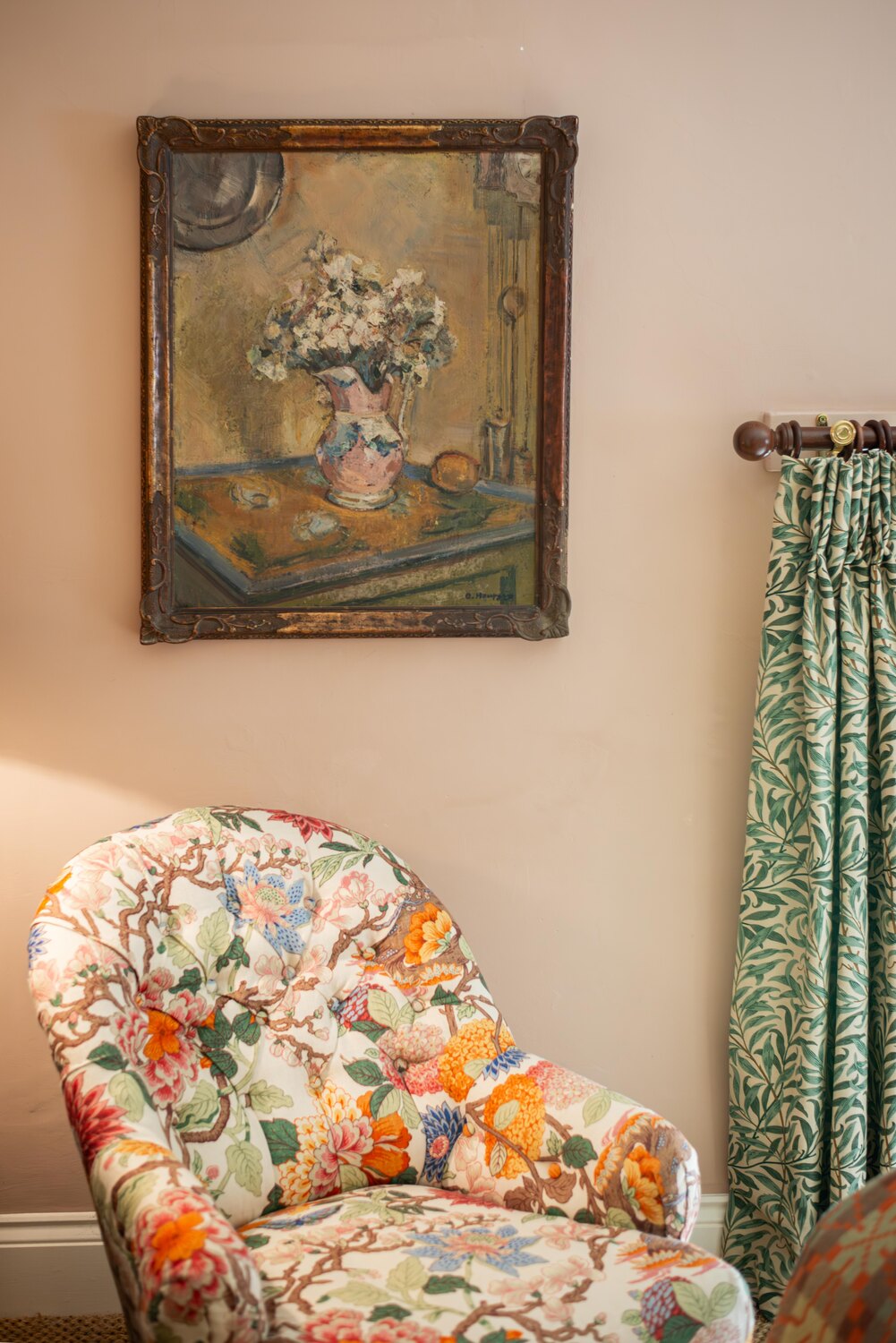 Impressionist artwork hung in an interior setting