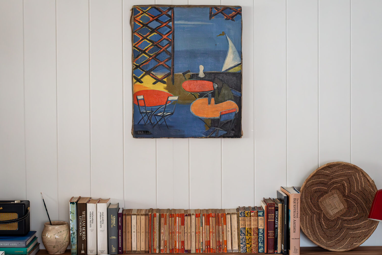 Summer artwork hung in an interior setting